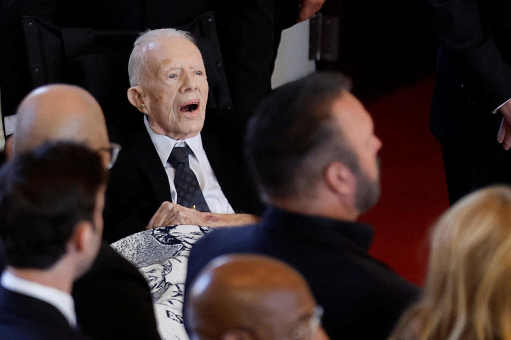 Former U.S. President Jimmy Carter attends a tribute service for his wife former first lady Rosalynn Carter, at Glenn Memorial Church in Atlanta on Nov. 28, 2023.