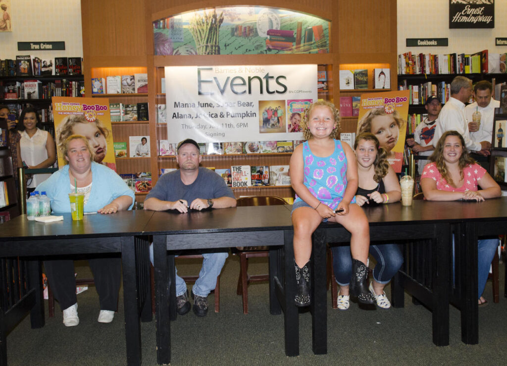 June "Mama" Shannon, Mike "Sugar Bear" Thompson, Alana "Honey Boo Boo" Thompson, Anna "Chickadee" Shannon and Lauryn "Pumpkin" Shannon attend the "How to Honey Boo Boo: The Complete Guide" Book Event at the Barnes and Nobles on July 11, 2013 in Mclean, Virginia