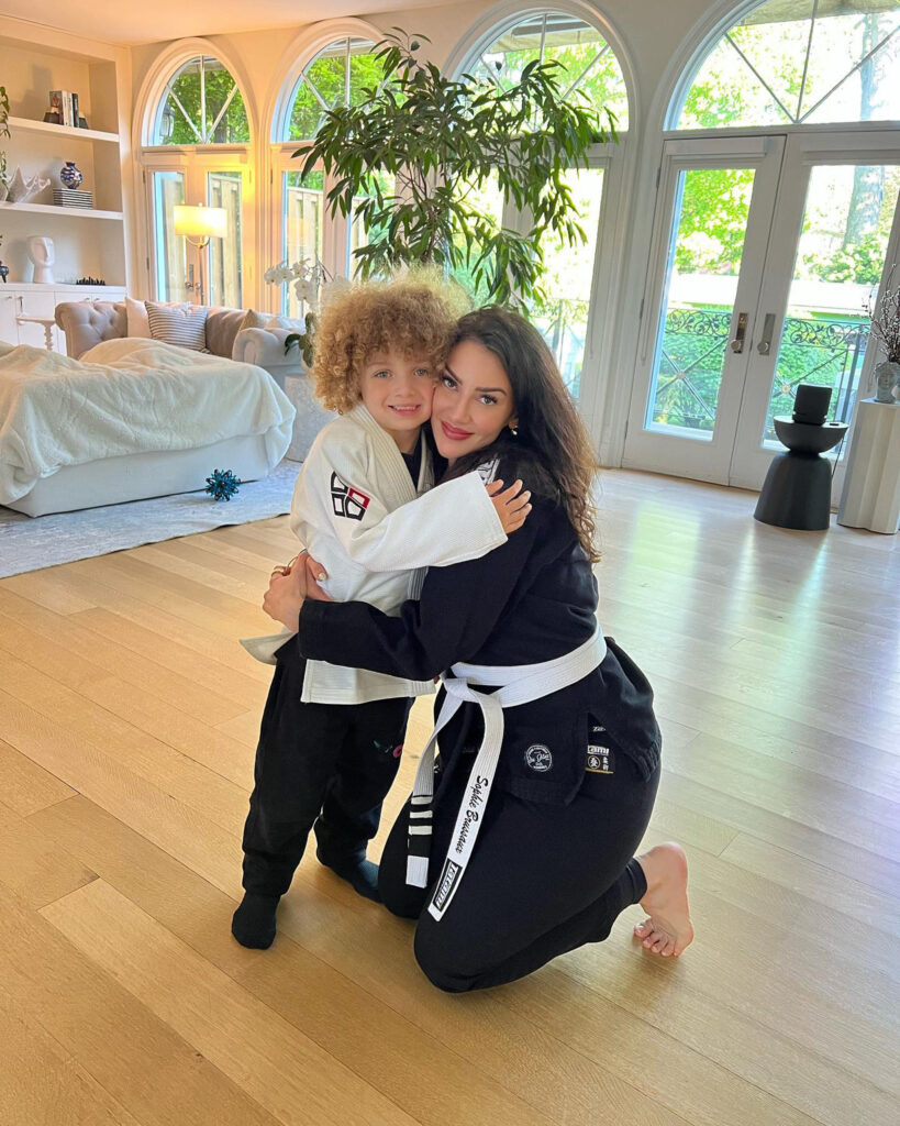 Drake's son Adonis matches Sophie Brussaux in martial arts uniforms