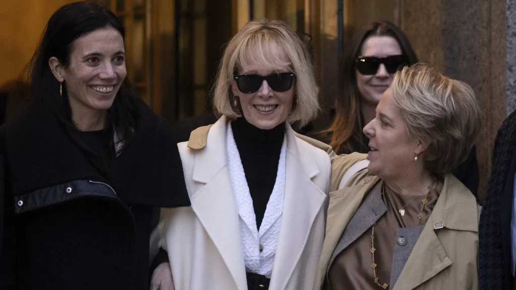 E. Jean Carroll leaves a New York court on Friday after a jury order former President Donald Trump $83.3 million for defaming her. Yuki Iwamura/AP