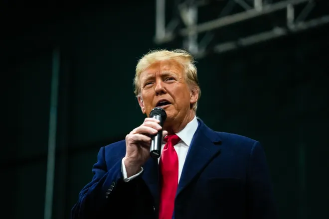 Former president Donald Trump speaks to caucus goers on Monday, Jan. 15, 2024, at Horizon Events Center in Clive.