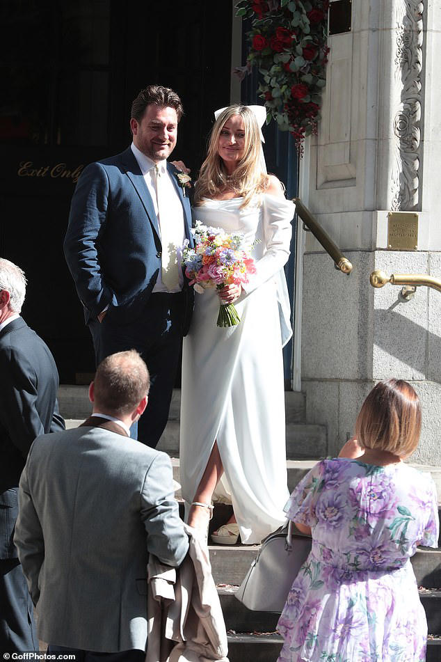 douxnews-lifestyle-Made-In-Chelsea-star-Francesca-Newman-Young-is-married-Former-reality-star-stuns-in-an-elegant-ivory-gown-as-she-ties-the-knot-with-Peter-Clarke-in-a-town-hall-ceremony.jpeg